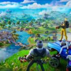 Fortnite, Google Play'e geri dönüyor: Yıllar süren yasal savaşlardan sonra bir zafer. a screenshot from the video game Fortnite. three characters sit or stand on top of a mountain around a purple lowrider car while staring down at the land below