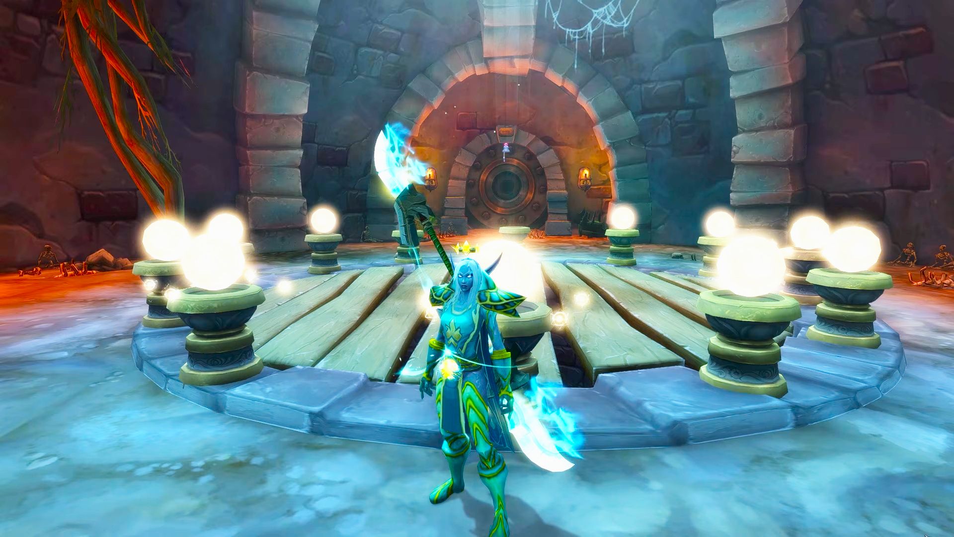 A screenshot of a room in World of Warcraft. A night elf character stands in front of a circular platform with twelve pedestals surrounding it.